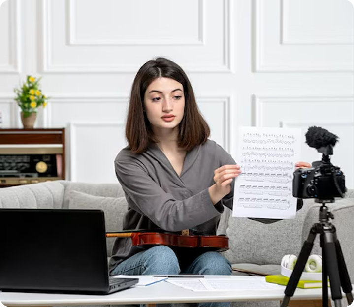Content creator presenting a printed article on camera in a studio setup